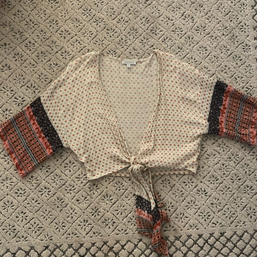 Patrons of Peace Wrap Top